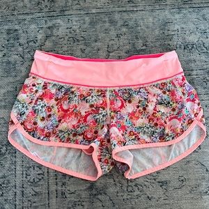 size 6 lululemon running shorts with built in briefs and zip back pocket